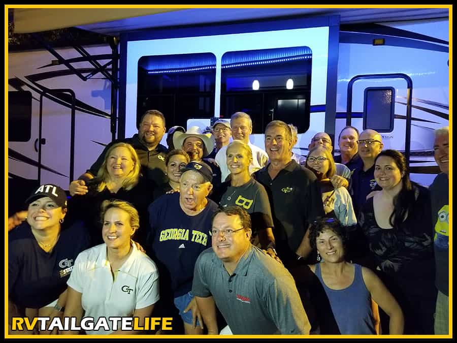 When the President of the Institute stops by your Friday night tailgate, you stop for a group photo in front of one of the RVs