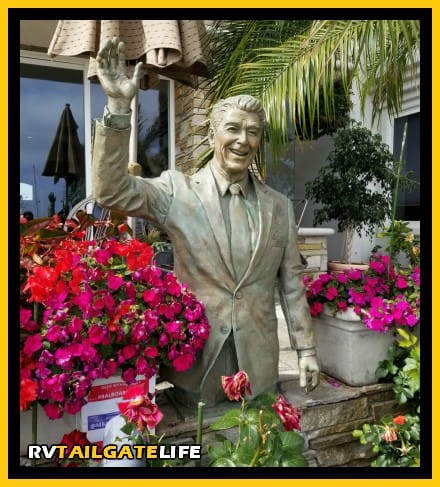 Find the statue of Ronald Reagan on the board walk on Balboa Island