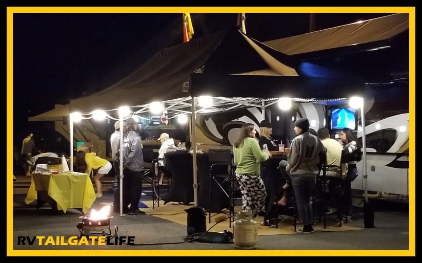 The Eurmax EZ Pop-up Tent is large enough to host all the best nighttime football tailgate parties