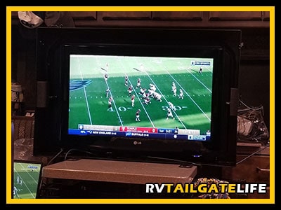 The MyTCase and TV used inside the RV to stream a football game