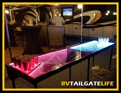 Infinty Beer Pong Table lit up at the RV tailgate