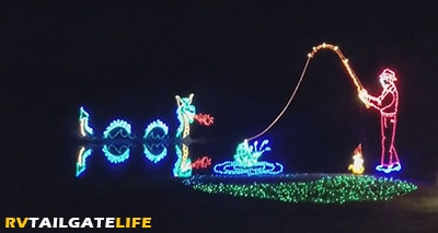 Dragon in the lake and fishing scene at the Festival of Lights