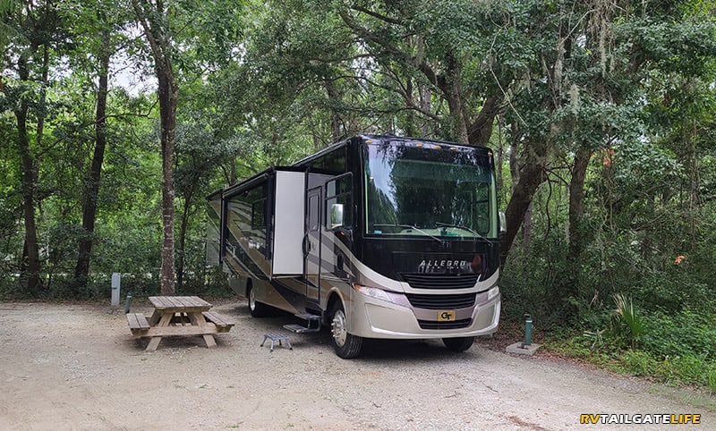 Class A RV at James Island County Campground in a back-in spot